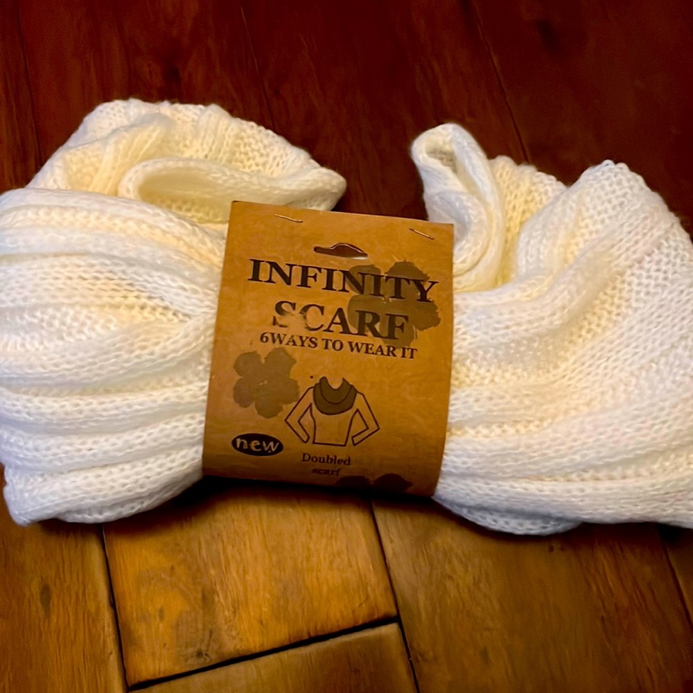 Infinity scarf can be worn 6 ways. White knit.